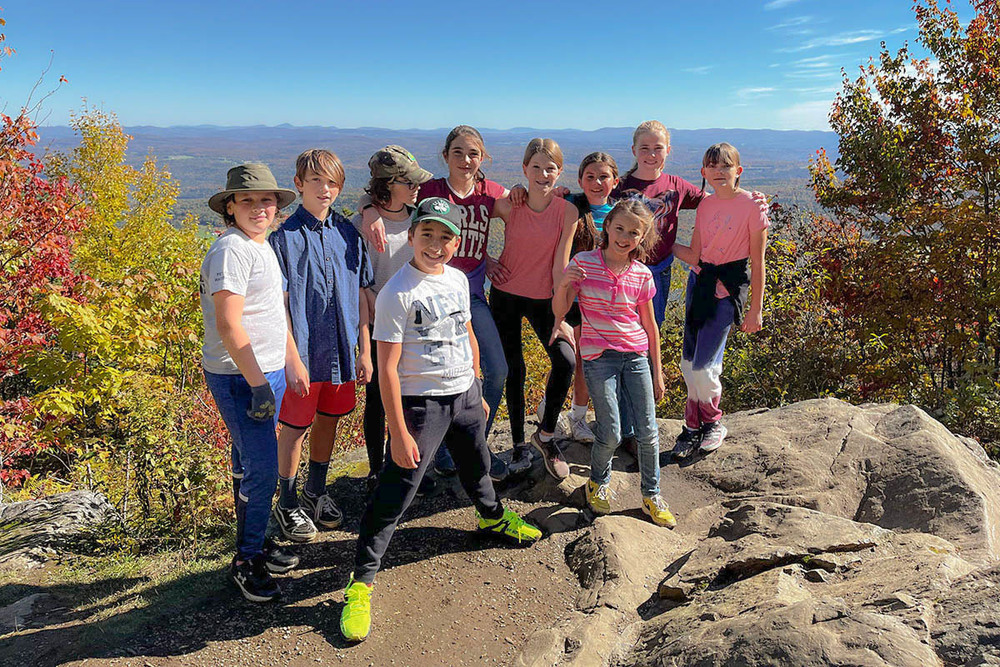 4th, 5th & 6th graders standing at the top of Elmore Mountain.